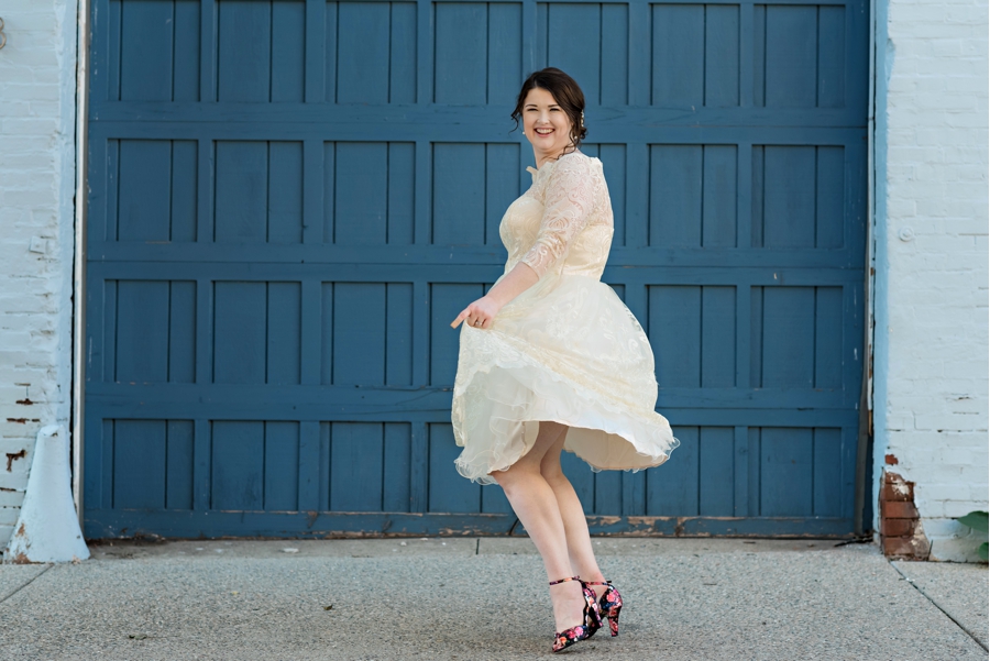 A bride spins in her wedding dress.